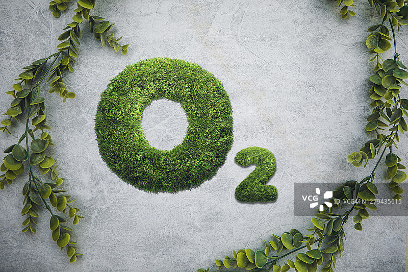 灰色背景下绿草上的氧气文字图片素材