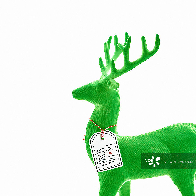 白色背景上的圣诞驯鹿祝福语图片素材