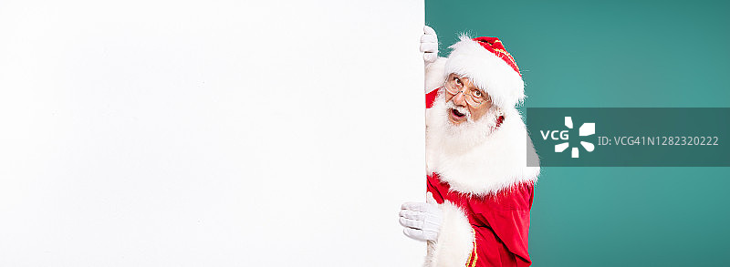 圣诞老人和白色空白板图片素材