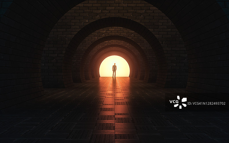 站在空旷未来通道里的男人图片素材