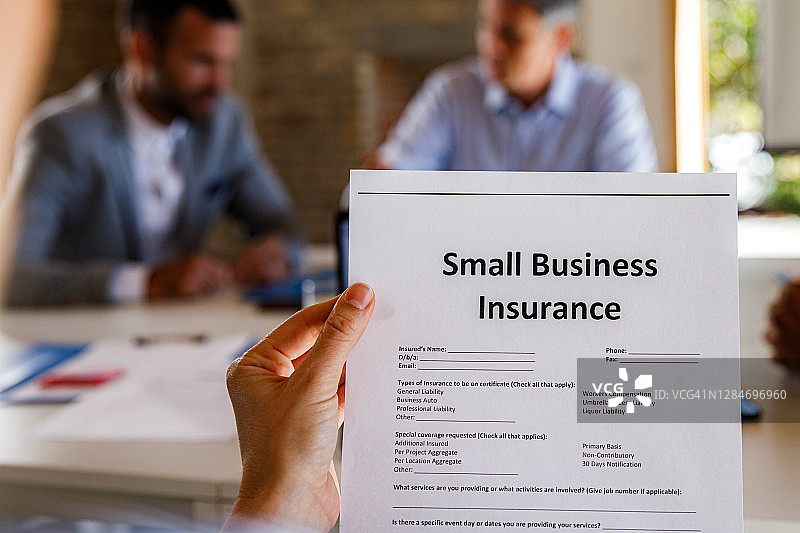 小型企业保险申请表特写图片素材
