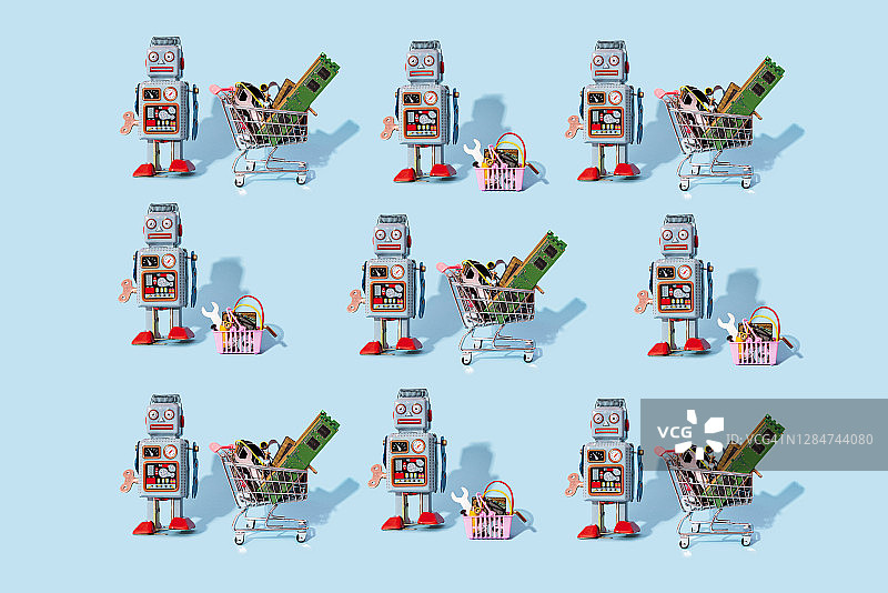 复古机器人玩具和装满电子设备的购物车图案图片素材