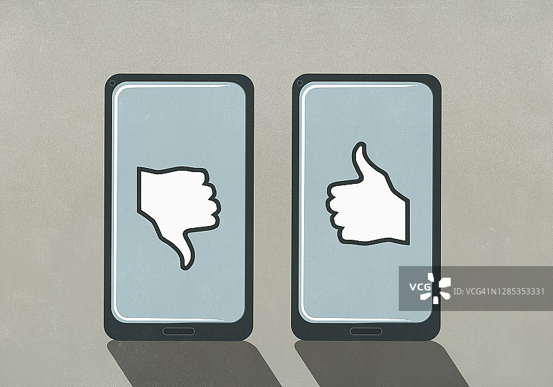智能手机屏幕上的赞和踩符号图片素材