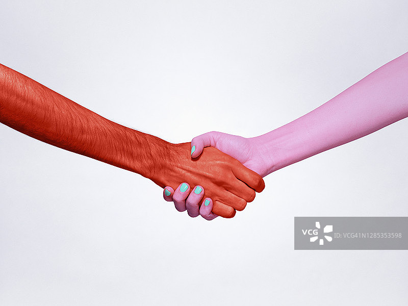 粉红色和红色的握手图片素材