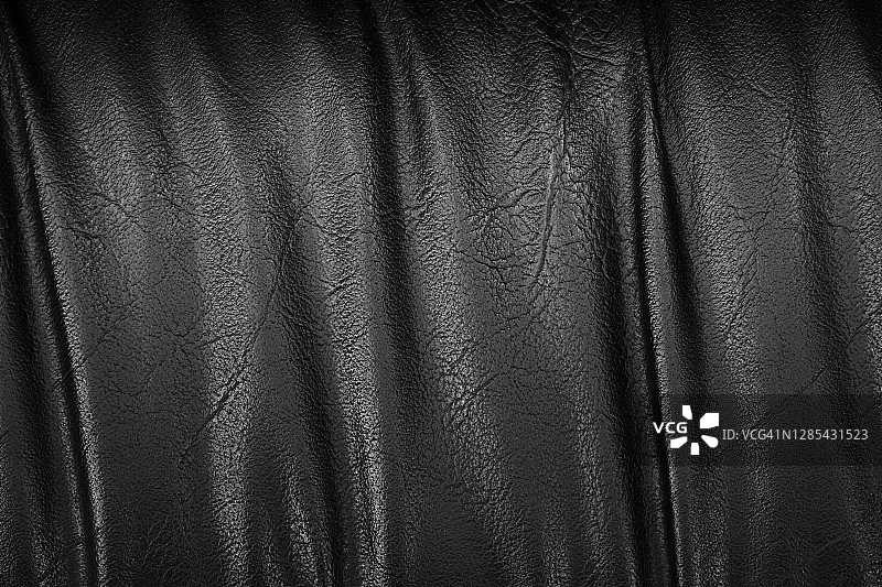黑色皮革纹理背景特写图片素材
