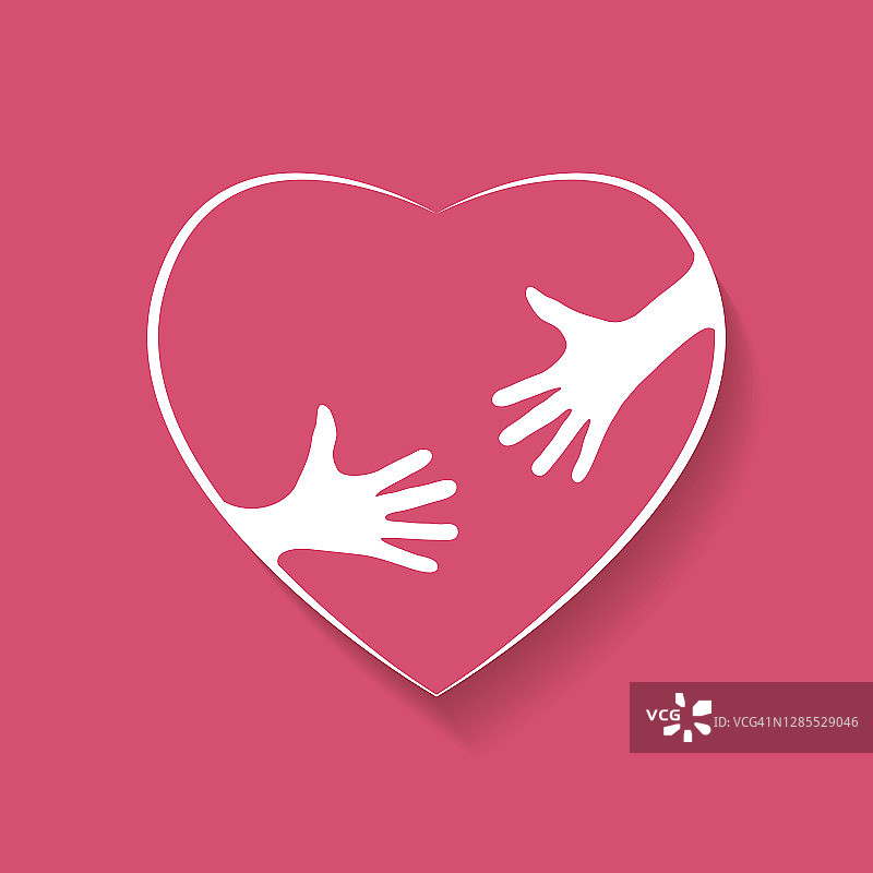 双手拥抱的心形剪影，爱的概念图片素材