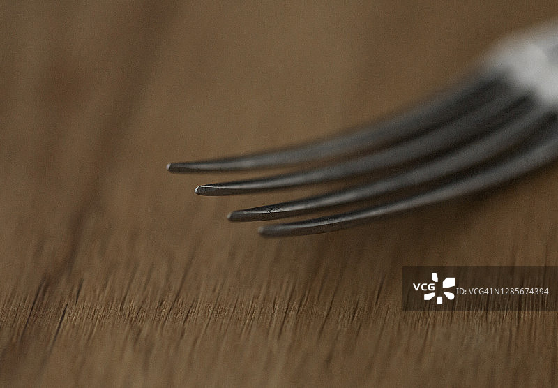 旧银叉齿的特写图片素材