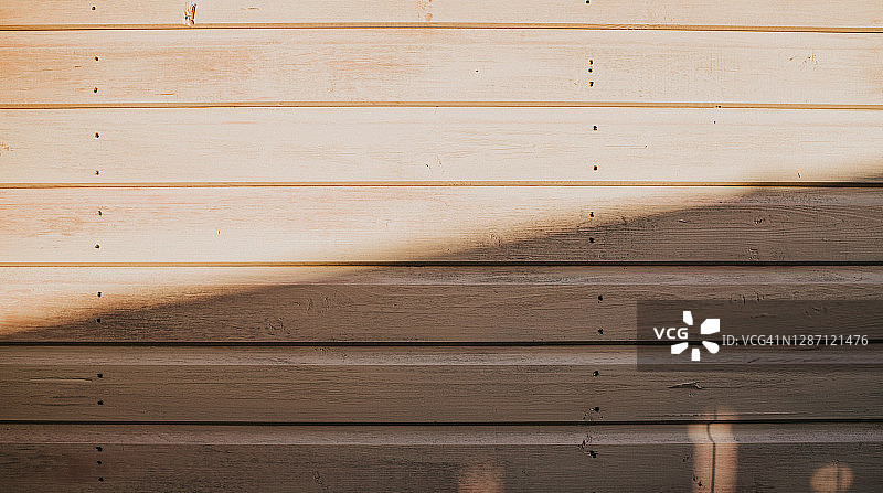 简约粉色木板阳光下有阴影图片素材