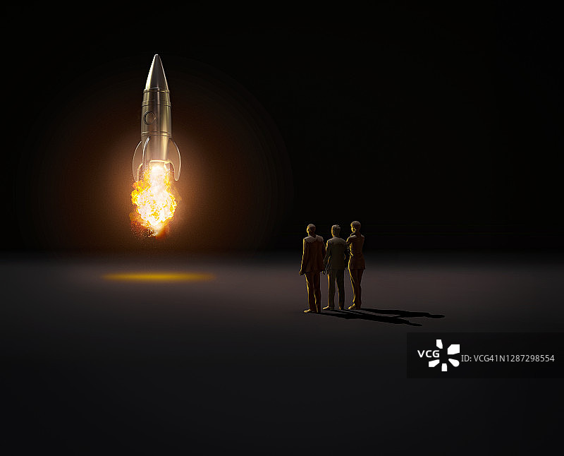 三个人观看火箭发射图片素材