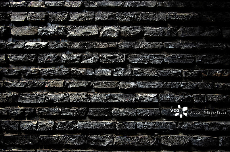 粗凿的黑色石墙图片素材