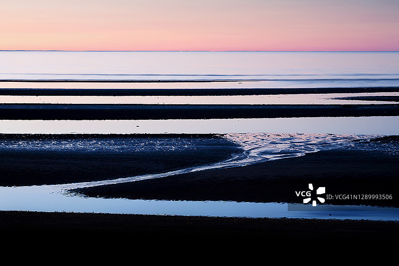 圣吕斯黄昏时的退潮景象图片素材