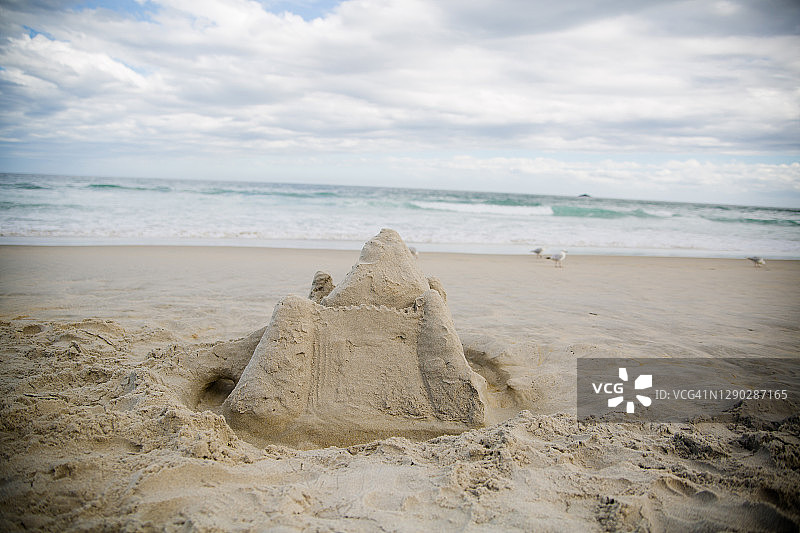 新西兰达尼丁海滩上的沙堡图片素材