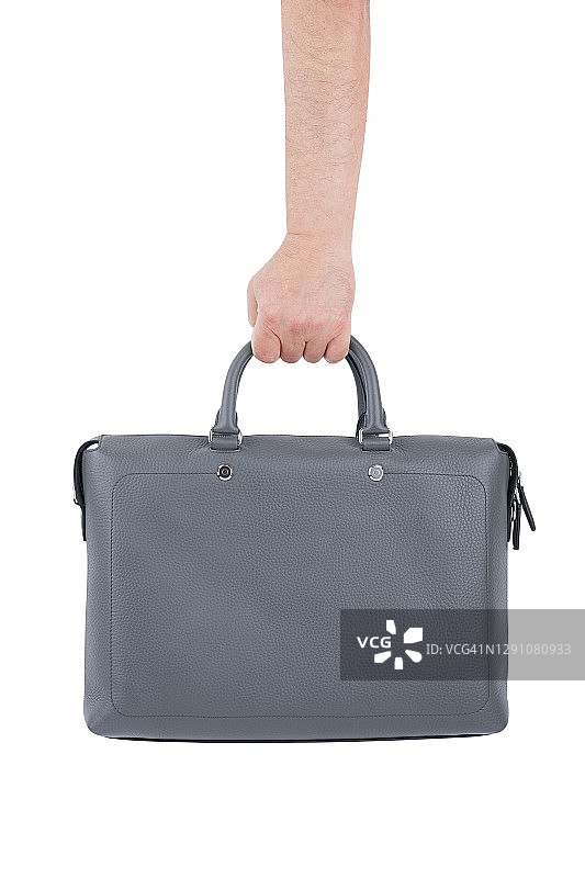白色背景上手持的灰色皮质公文包图片素材