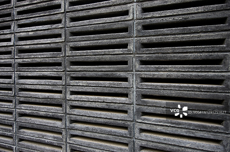 灰色旧混凝土砌块墙图片素材