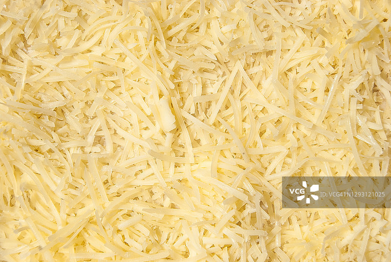 磨碎的奶酪堆特写图片素材