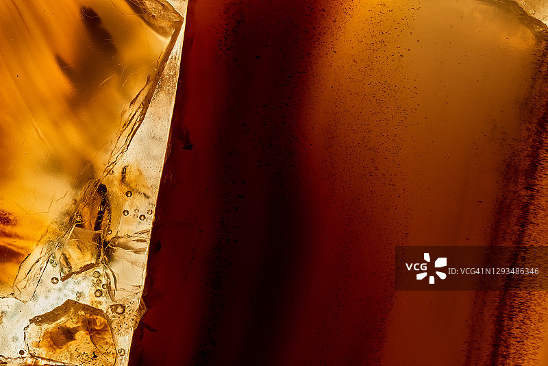 抽象黄色石材背景，自然图案。图片素材