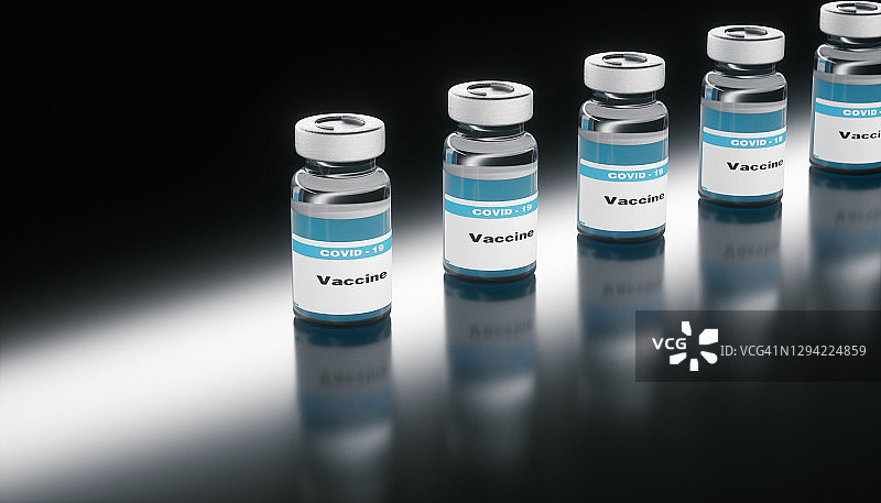 黑色背景上的新冠疫苗安瓿瓶图片素材