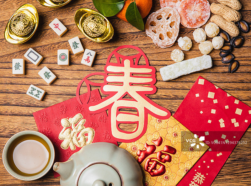 中国新年传统小吃与红包的扁平摆放图片素材