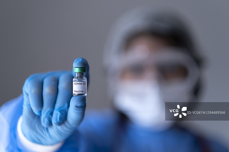 手中的注射器，疫苗接种设备图片素材