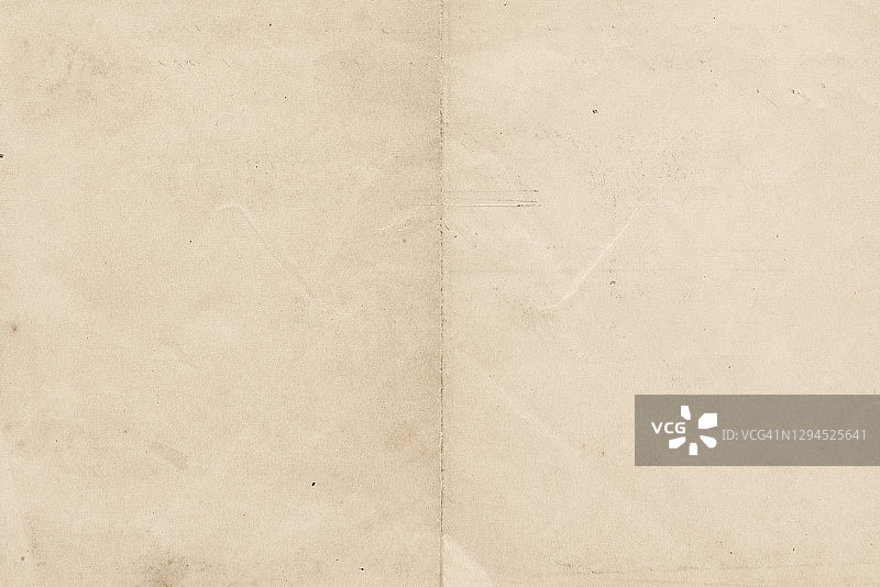 折叠的旧棕色纸张纹理背景图片素材