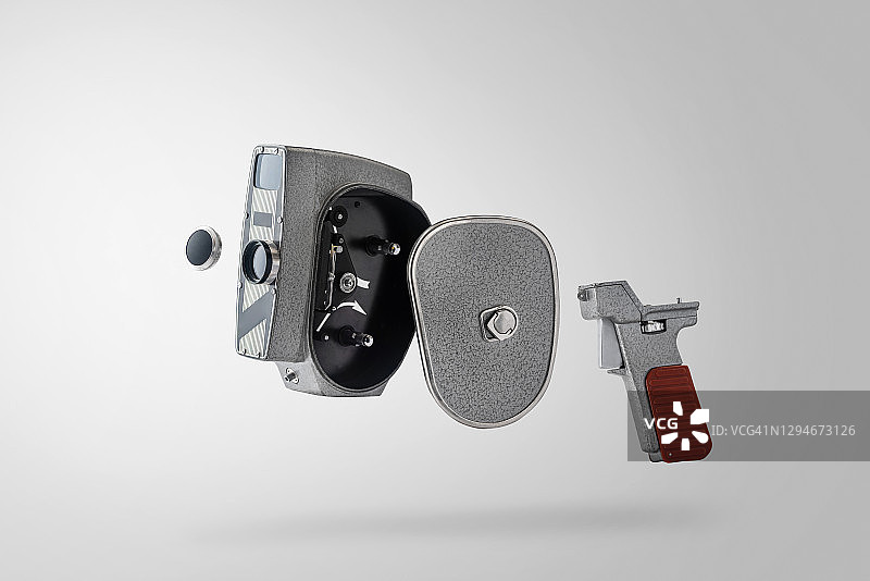 灰色背景上的拆卸模拟相机图片素材