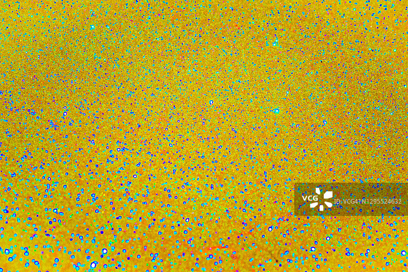 带有蓝绿色斑点的金色材质背景图片素材