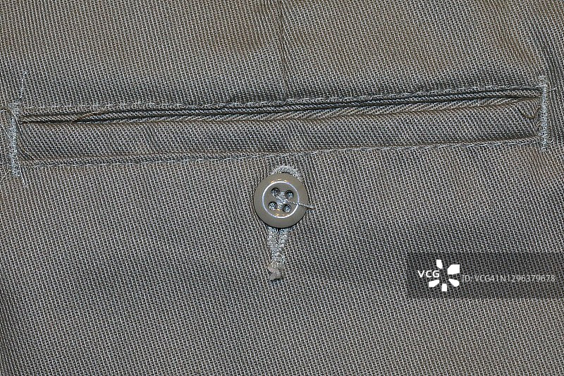 裤子口袋上的纽扣图片素材