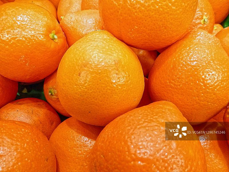 市场上的米尼奥拉/坦桔水果特写图片素材