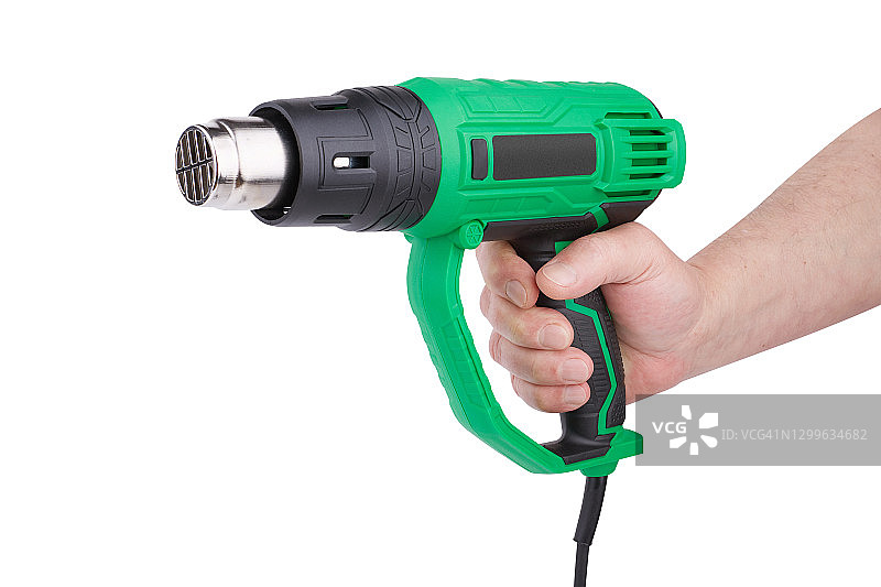 手中握着的工业热风枪，白色背景图片素材