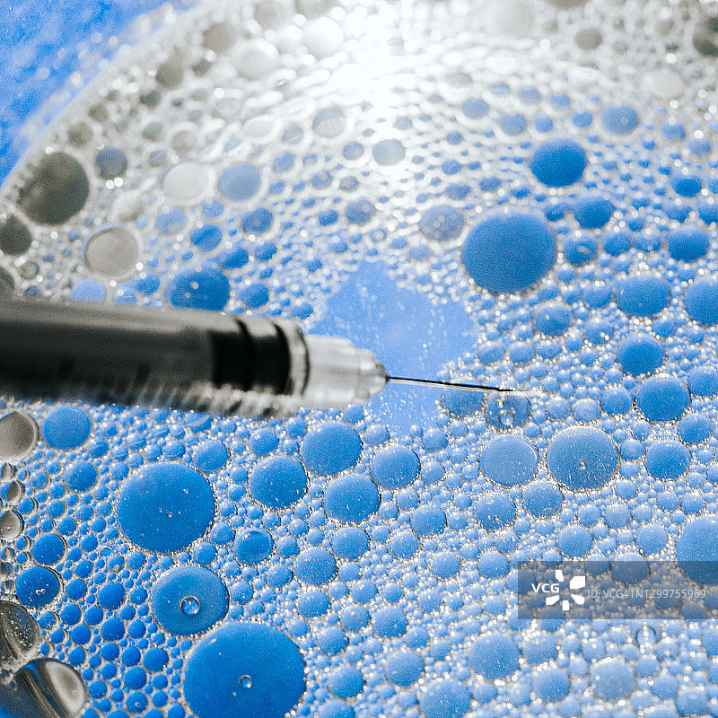 注射器和疫苗的概念图像，微距拍摄图片素材