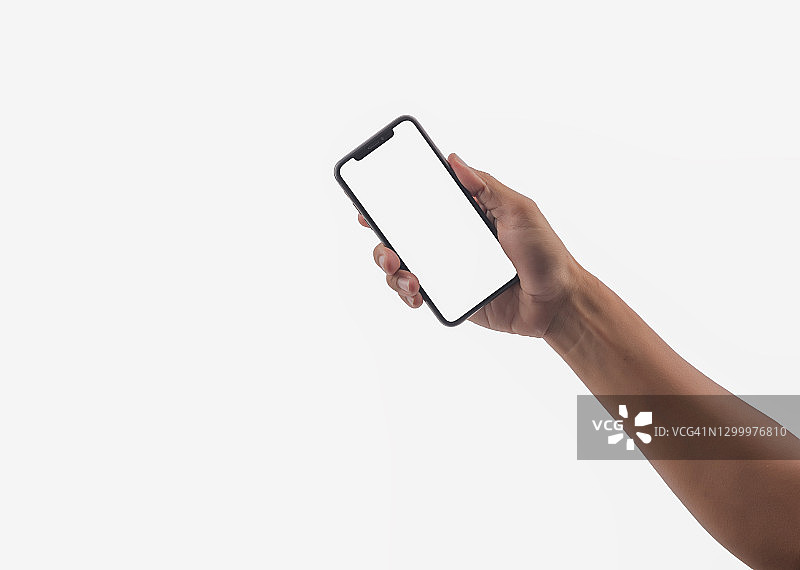女人手持智能手机特写，白色背景图片素材