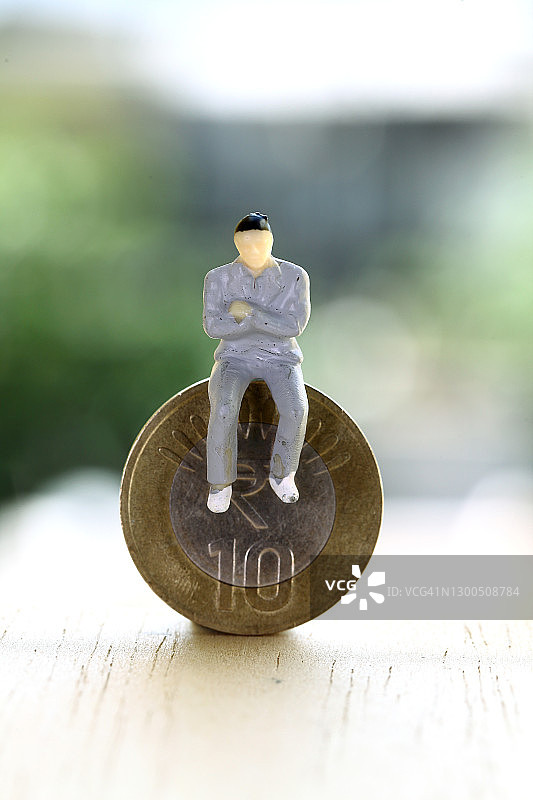 卢比硬币上的人偶图片素材