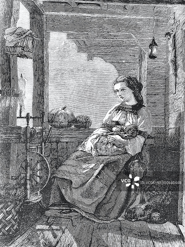 在阿尔卑斯山上节日早晨，美丽的女人抱着她的宝宝坐在椅子上，沉浸在白日梦中图片素材