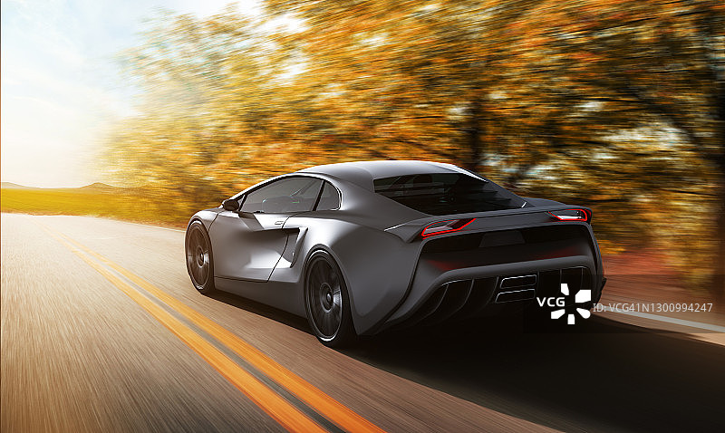 在道路上行驶的灰色跑车图片素材