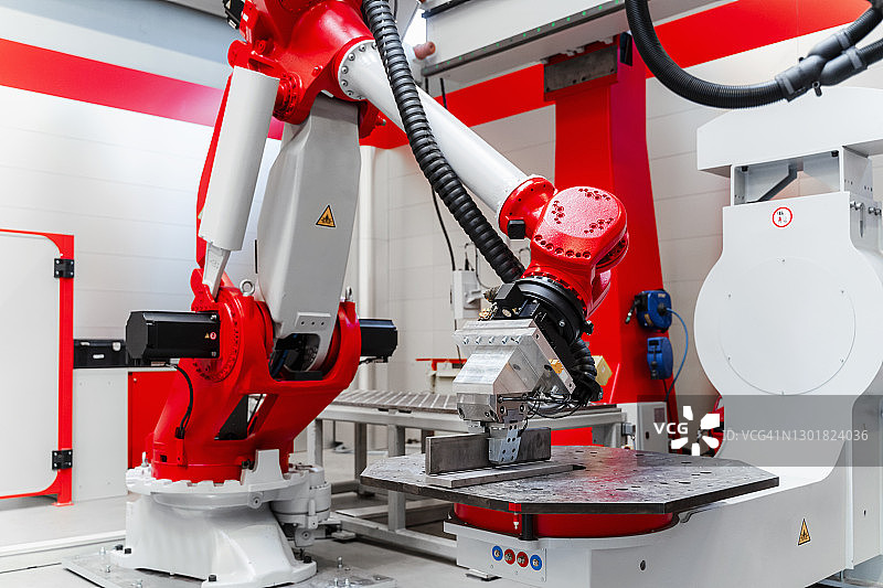 工厂中的机器人焊接机械图片素材