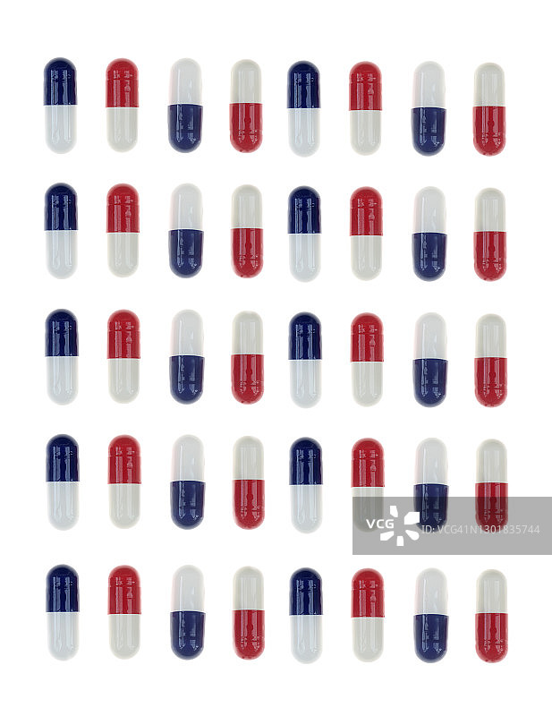 排列成行的红白蓝对乙酰氨基酚胶囊图片素材