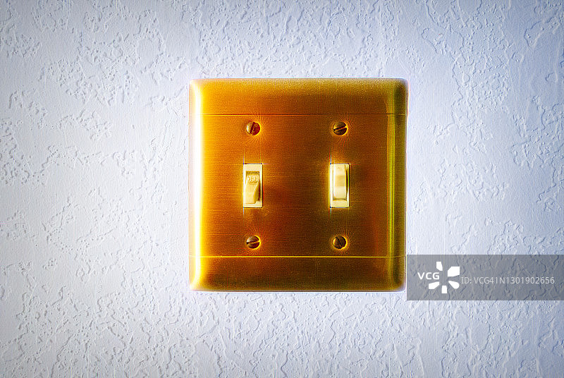 墙上的闪亮灯开关图片素材