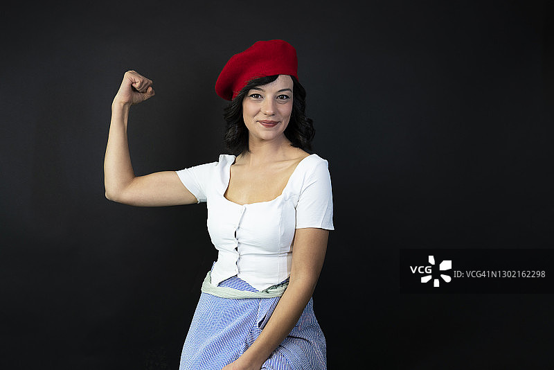 女人展示她的力量：我们能做到图片素材