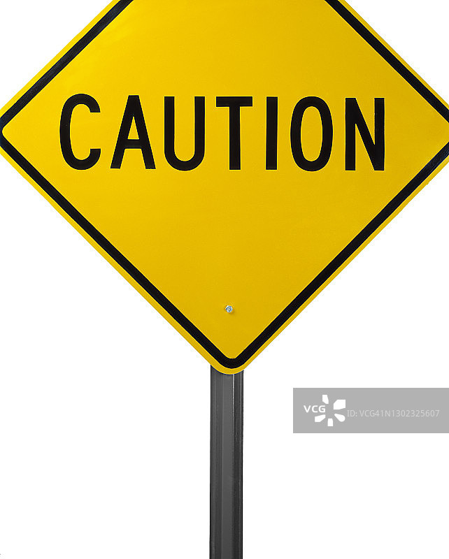 白色背景上的警示路标特写图片素材