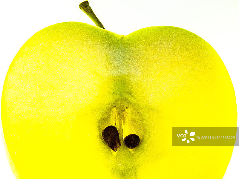 明亮切片金冠美味成熟苹果图片素材