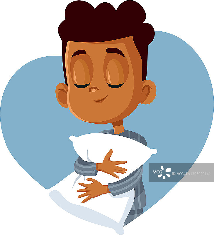 抱着枕头准备睡觉的非洲男孩图片素材