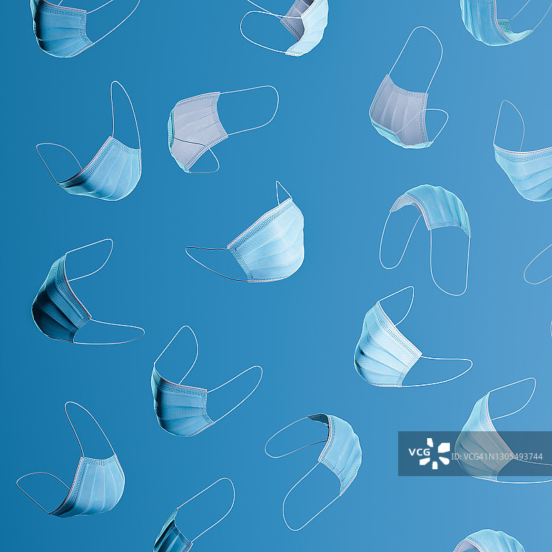 蓝色背景上的防护口罩图案图片素材