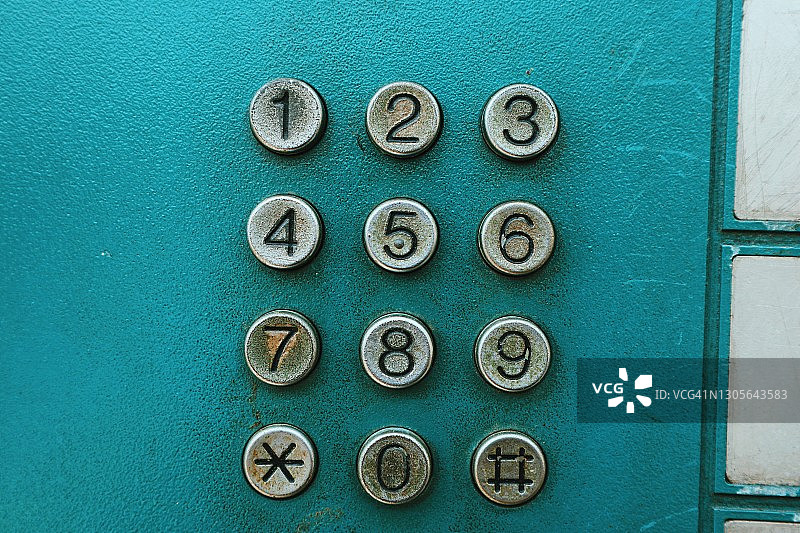 老式电话按钮的特写镜头图片素材
