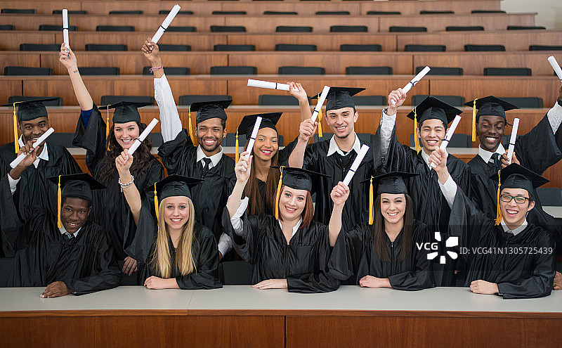 快乐的毕业生库存照片图片素材