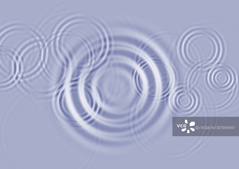 雨滴落在水面产生的同心圆全画幅图片素材