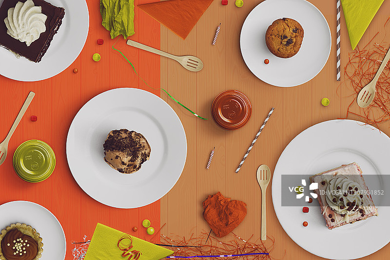 俯视：带有蜡烛、蛋糕和五彩纸屑的生日派对桌面图片素材