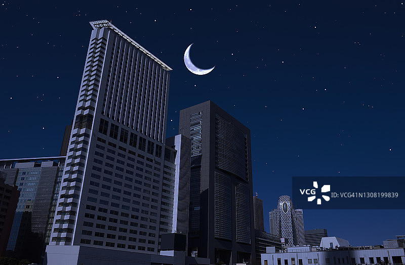 东京新宿天际线上升起的弯月图片素材