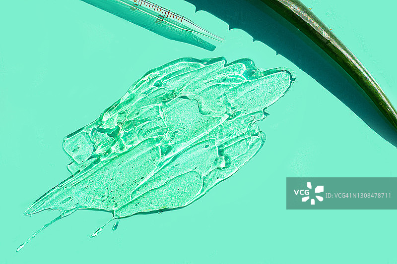 芦荟叶和植物凝胶涂抹质地图片素材