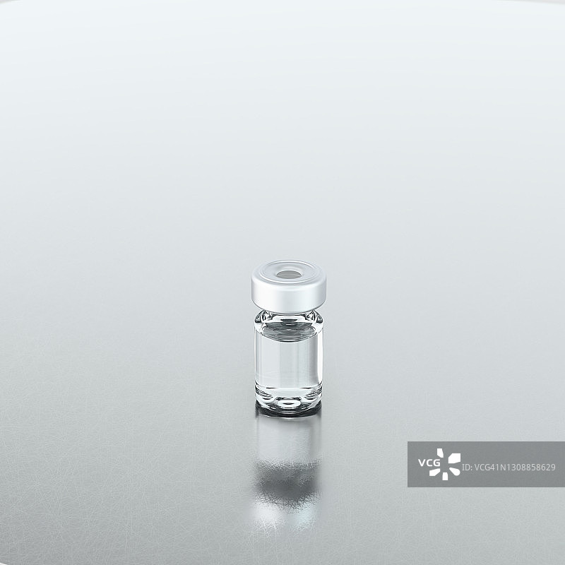 不锈钢背景上的玻璃药瓶，低角度图片素材