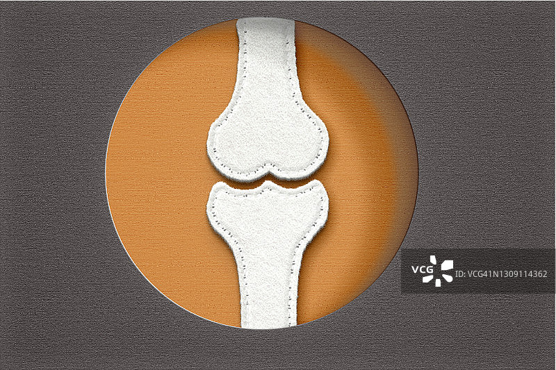 棕色背景上的毛毡膝盖骨概念图图片素材